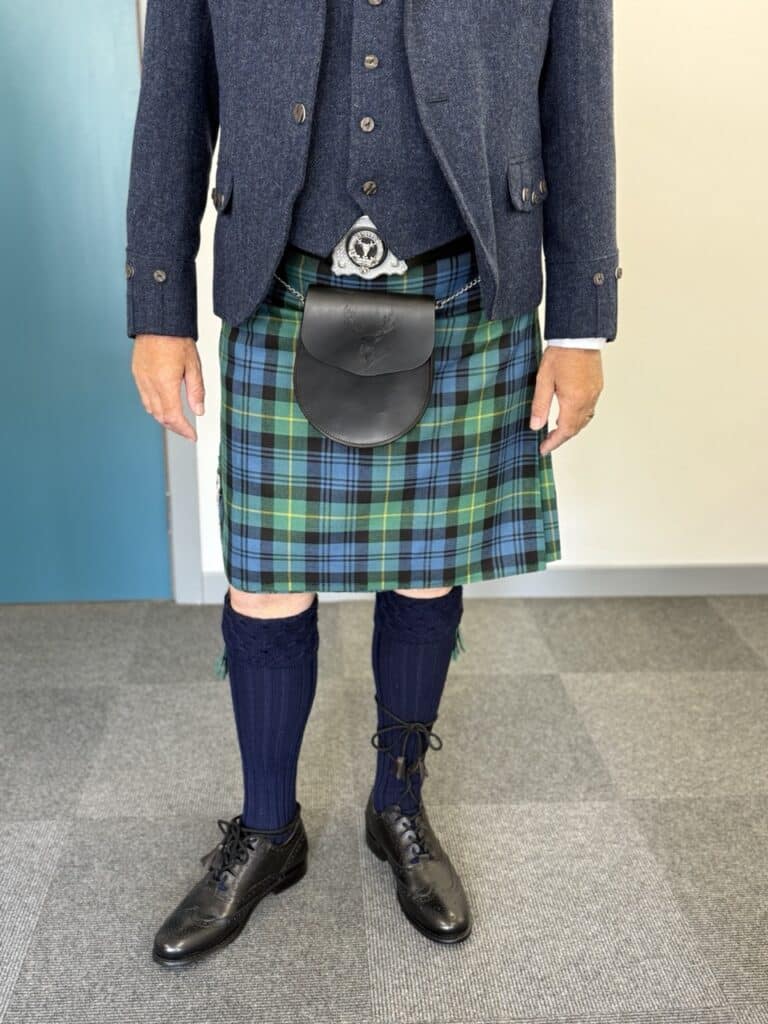 Bespoke handcrafted leather sporran and hand-sewn kilt by Kate Robertson